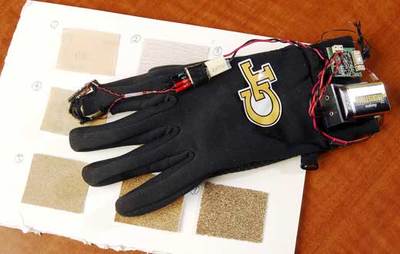 新型震动手套可帮助宇航员和医生手指的灵敏度-科教台-中国网络电视台